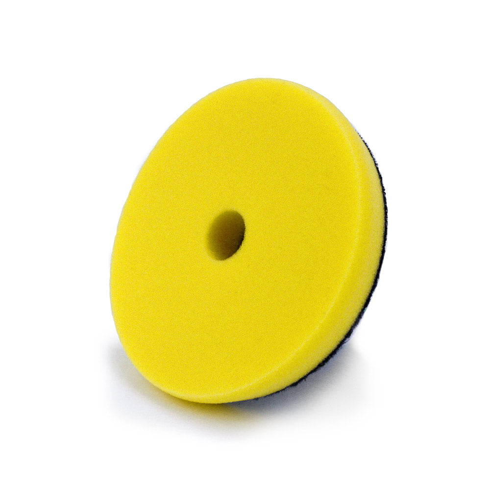 whitebox floating product image of (1) 5.5" yuellow foam one step, medium foam polishing pad with tapered edge design and .75: center hole
