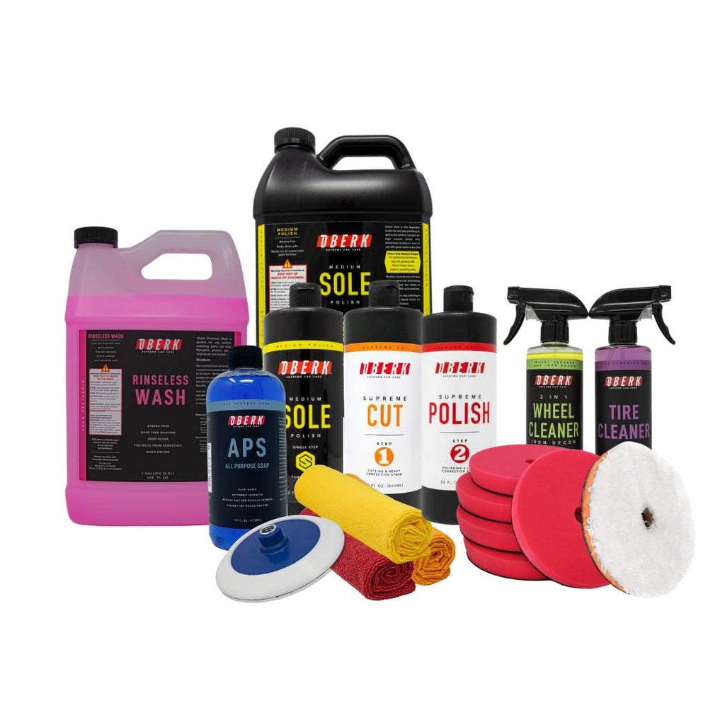 whitebox image of various Oberk Car Care products including rinseless wash, polishes, compound, polishing pads, microfiber cutting pads, soap and wheel cleaner