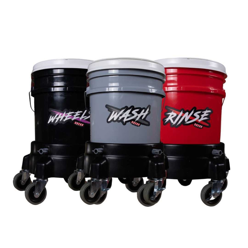 white-box image of Wash bucket kit with grit guards, gamma seal lids, and grit guard dollys white tops